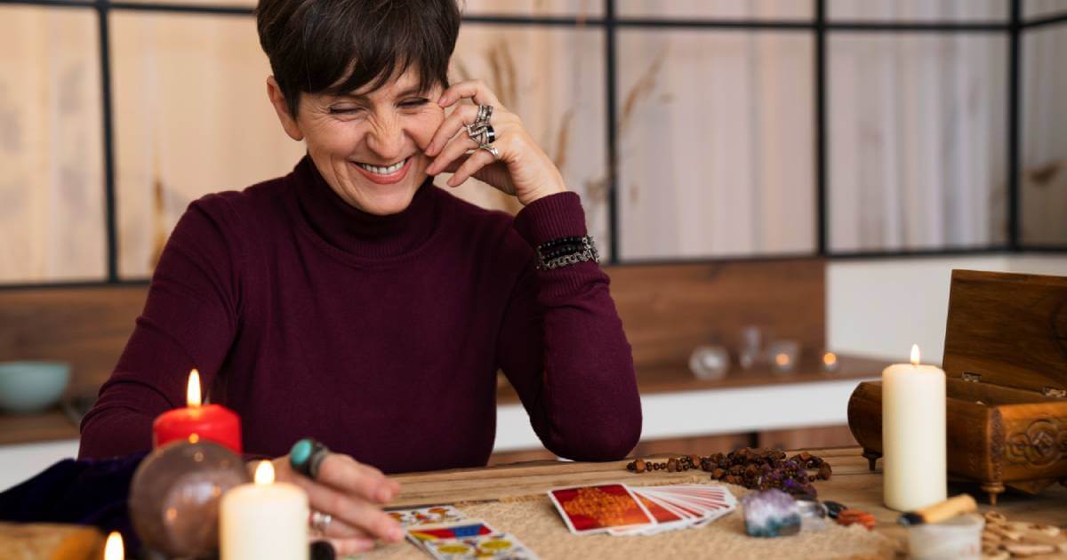 A person comparing their numerology life path number calculation with their detailed astrology birth chart on a tablet.